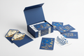 Indigo Garden Notecard Set – studio shot showing rigid gift box open with cards and matching envelopes spread artfully around it