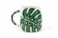 Monstera Leaf Ceramic Mug 12 oz – studio shot from three-quarter angle on white background